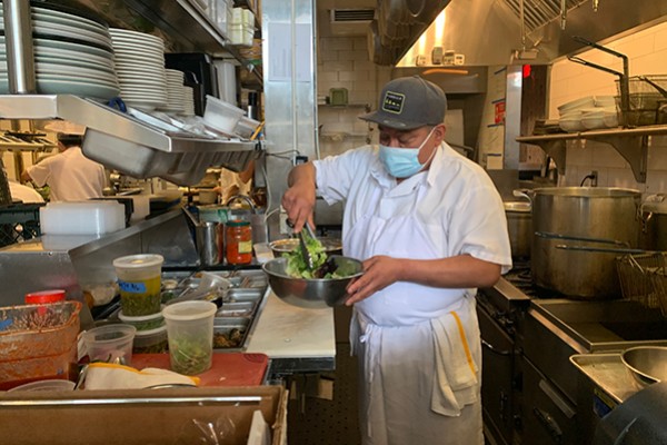 Jorge Antonio Dzib Medina prepares a salad at San Francisco restaurant, Fiorella.