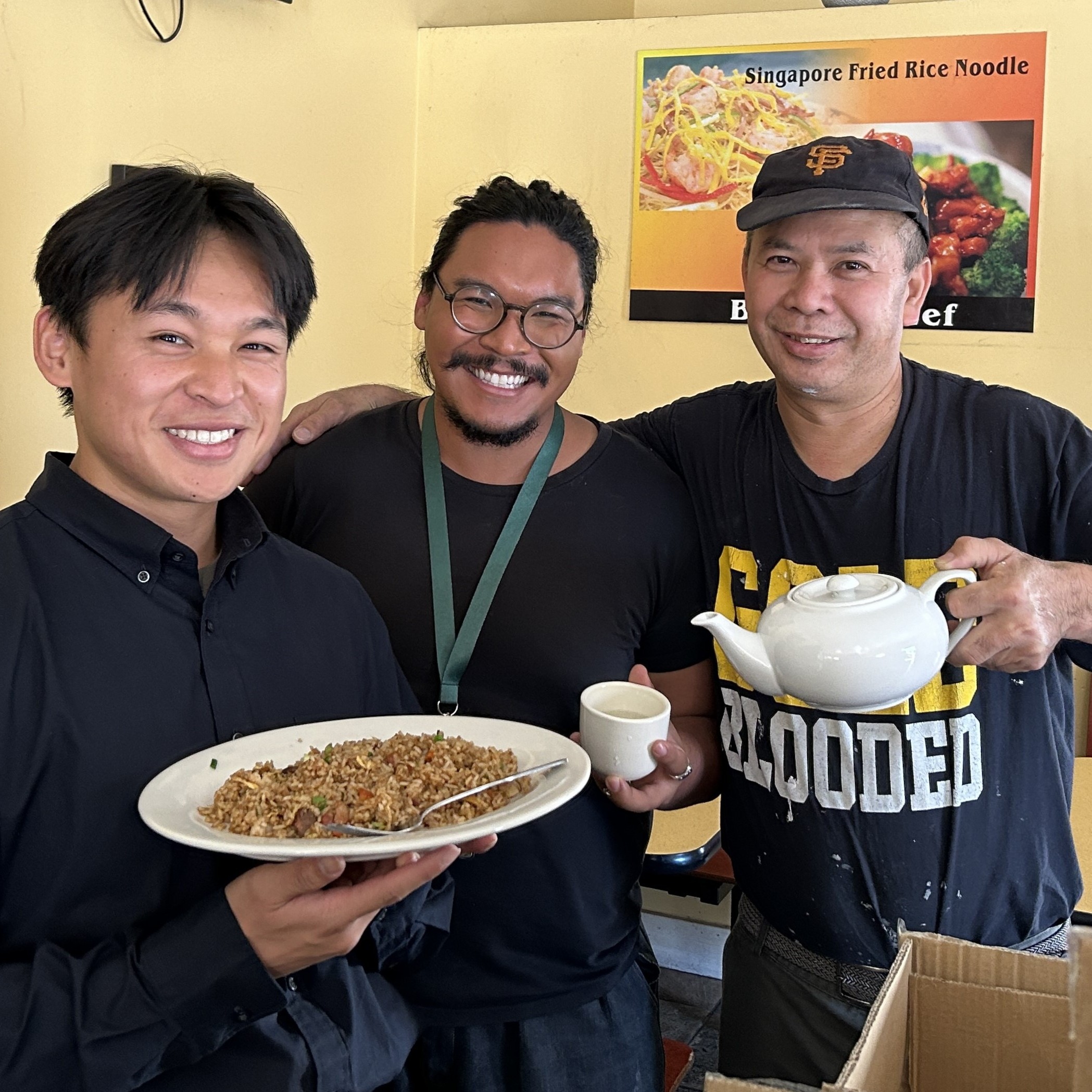 SFE staff holds up reusable foodware with San francisco restaurant owner